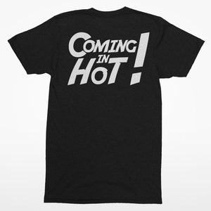 May include: Black t-shirt with white text that reads "Coming in Hot!"