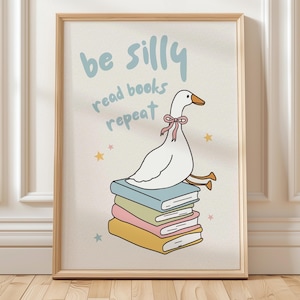 Impresión digital caprichosa de arte de ganso con lectura de libros y repetición para habitación infantil, guardería, biblioteca o decoración de aula.