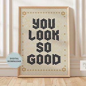 May include: Framed wall art with the words "YOU LOOK SO GOOD" in black letters on a mosaic background. The art is in a light wood frame and is labeled "Digital Download". The Pixel Pals Art Shop logo is in the bottom right corner.
