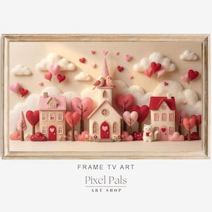 May include: A framed artwork featuring a whimsical village scene with houses, trees, and clouds, all in soft pinks and reds. Heart-shaped elements and a church with birds add to the romantic theme. The text "Pixel Pals ART SHOP" is at the bottom.