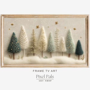 May include: A framed artwork featuring a winter scene with stylized trees in shades of green, white, and gold. The trees are arranged in a row against a snowy backdrop, with gold star accents. The artwork is labeled "FRAME TV ART" and "Pixel Pals ART SHOP".