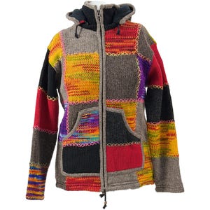 May include: A colourful patchwork hooded jacket with a full zip. The jacket displays a variety of colours, including red, yellow, black, and grey, in a geometric pattern. It has a front pocket and a drawstring hood.