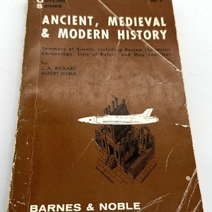 May include: A vintage brown book titled "ANCIENT, MEDIEVAL & MODERN HISTORY" by J.A. Rickard and Albert Hyma. The cover features a drawing of a jet and a castle. The book is from the "COLLEGE OUTLINE SERIES" and published by Barnes & Noble.