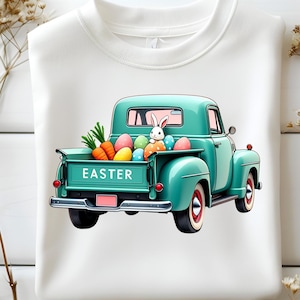 May include: A teal blue vintage pickup truck with a white bunny rabbit and colorful Easter eggs in the bed. The truck has the word "EASTER" written on the back.