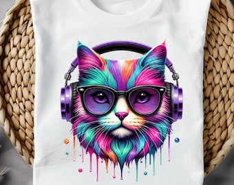 May include: A white t-shirt with a colorful illustration of a cat wearing headphones and sunglasses. The cat's fur is a mix of pink, blue, green, and yellow. The headphones are purple and the sunglasses are black. The illustration is dripping with paint.