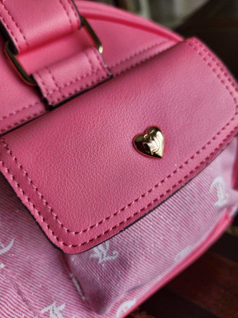 Juicy Couture pink and white lemonade pack it up bowler shoulder bag 2 front pockets accent and printed logo all over the purse image 13