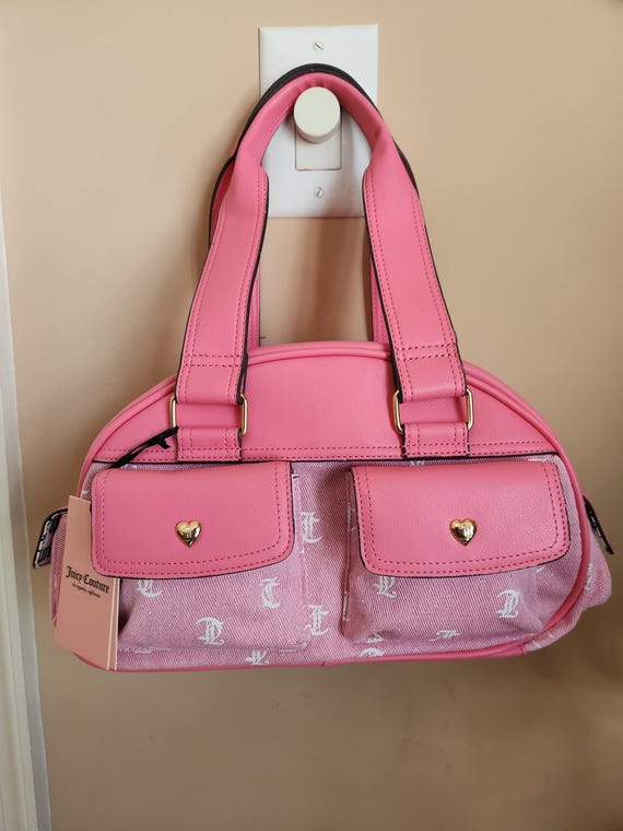 Juicy Couture pink and white lemonade pack it up bowler shoulder bag 2 front pockets accent and printed logo all over the purse
