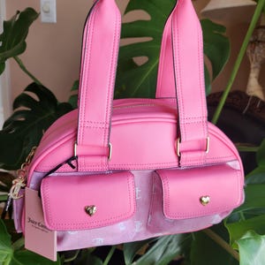 Juicy Couture pink and white lemonade pack it up bowler shoulder bag 2 front pockets accent and printed logo all over the purse image 2