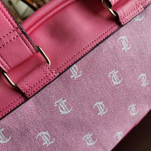 Juicy Couture pink and white lemonade pack it up bowler shoulder bag 2 front pockets accent and printed logo all over the purse image 14
