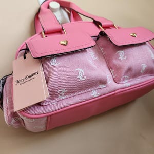 Juicy Couture pink and white lemonade pack it up bowler shoulder bag 2 front pockets accent and printed logo all over the purse image 4