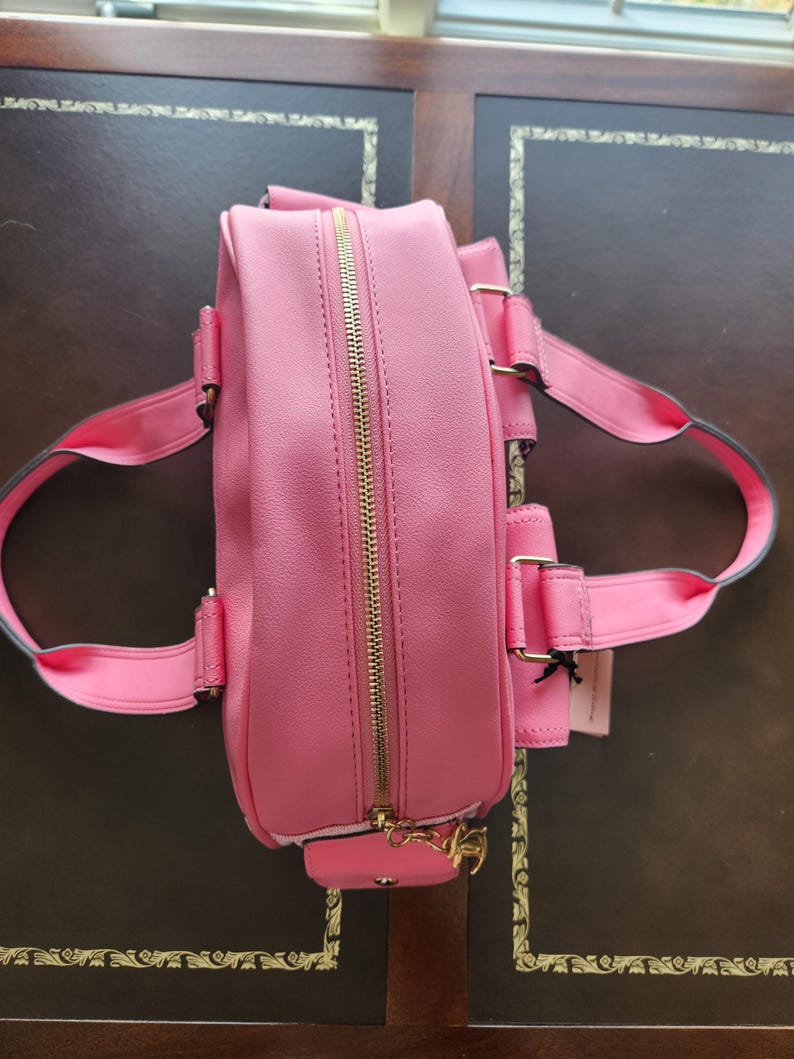 Juicy Couture pink and white lemonade pack it up bowler shoulder bag 2 front pockets accent and printed logo all over the purse image 11