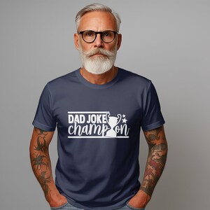 お父さんジョークチャンピオンTシャツ、面白いお父さんシャツ、お父さんへのユーモアギフト、お父さんの誕生日プレゼント、お父さんTシャツ