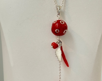 Silver necklace with coral bead pendant inlaid with silver and 3 charms: map of Corsica, an amulet and a red coral bead.