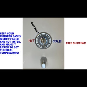 May include: A silver faucet with a round handle labeled "HOT", "COLD", and "JUST RIGHT" in red, blue, and black text. The faucet is mounted on a white wall.