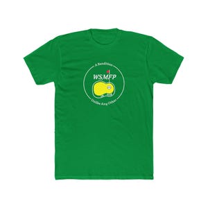 May include: A green t-shirt with a white circle graphic. The graphic features a yellow golf green with a red flag and a white golf ball. The text "WSMFP" is in white letters inside the circle. The text "A Rendition" and "Unlike Any Other" are in white letters below the circle.