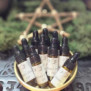Aceite para atraer dinero - Aceite para atraer dinero rápido - Aceite para rituales de dinero - Manifiesta mayor flujo de efectivo - Aceite de unción - Suministros de brujería - Herramientas para hechizos