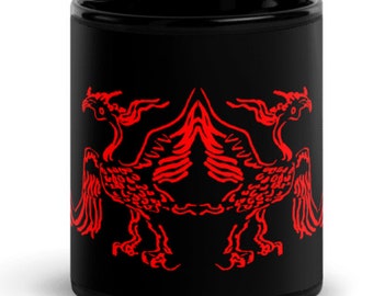 Ancient giant red  bird totem black mug. Hand crafted with intricate details, this unique piece evokes a sense of mystique and history.