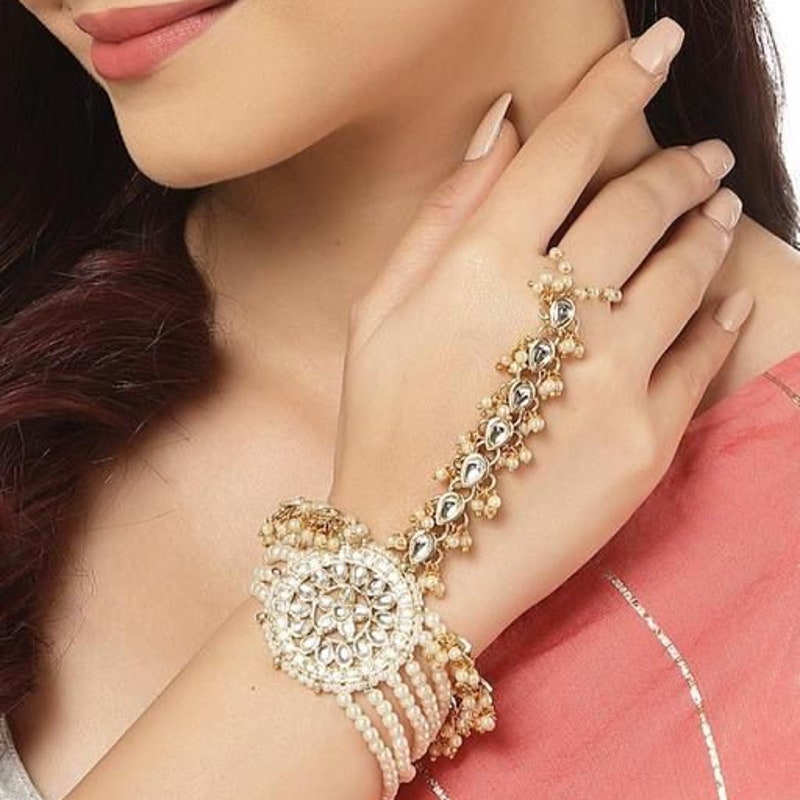 Traditional Gold Plated Kundan Haath Phool/Panja/Adjustable Bracelet with Ring for Women main image 1