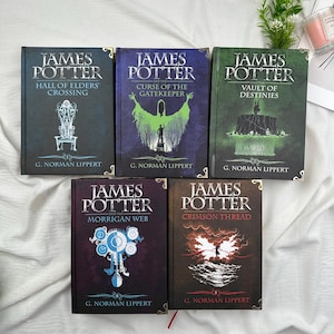 May include: Five hardcover books with the title "James Potter" and various subtitles. The covers feature illustrations in shades of blue, green, and brown, with gold corner accents. The author's name, G. Norman Lippert, is printed at the bottom of each book.
