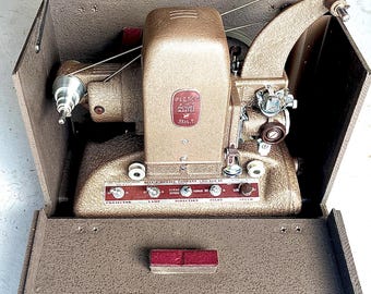 Vintage Bell & Howell Filmo 8MM Projector