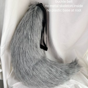 May include: A gray faux fur tail with a black adjustable belt. The tail is 70 inches long and has no metal skeleton or plastic base.