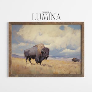 May include: A framed print of a bison in a field under a cloudy sky. The artwork features a large bison in the foreground and another in the distance. The frame is a dark brown color, and the text "GALERIA LUMINA" is at the top.