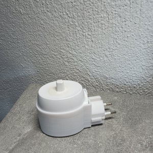 Oral B electric toothbrush holder charging station wall socket image 5