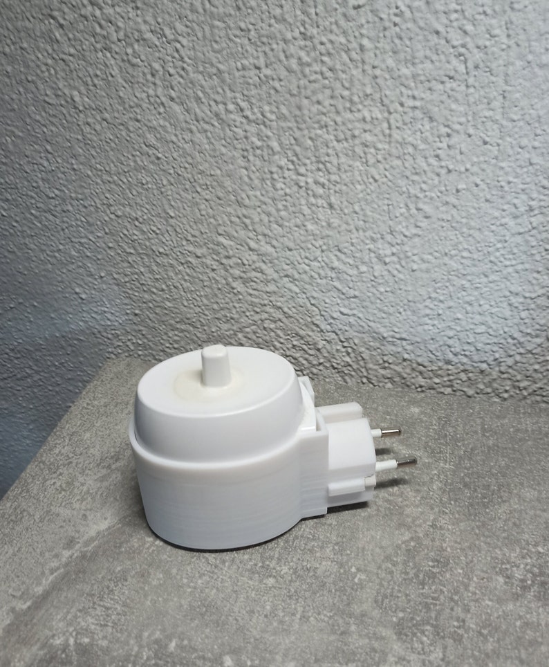 Oral B electric toothbrush holder charging station wall socket image 5