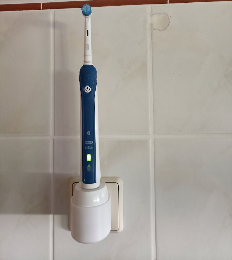 Oral B electric toothbrush holder charging station wall socket image 3