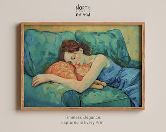 Pode incluir: Uma impressão artística em moldura de madeira com uma pintura a óleo de uma pessoa de cabelo ruivo com um vestido azul, deitada num sofá azul-petróleo enquanto abraça um gato malhado laranja. O texto NORTH STUDIO ART PRINT e Timeless Elegance, Captured in Every Print estão presentes.