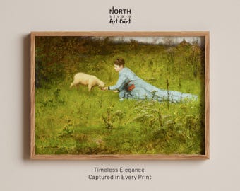 May include: A framed art print featuring an oil painting of a person in a light blue dress kneeling in a green field, feeding a small white lamb. The text NORTH STUDIO ART PRINT appears at the top, and Timeless Elegance, Captured in Every Print at the bottom.