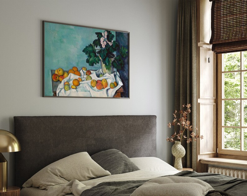 a bed in a bedroom with a painting on the wall