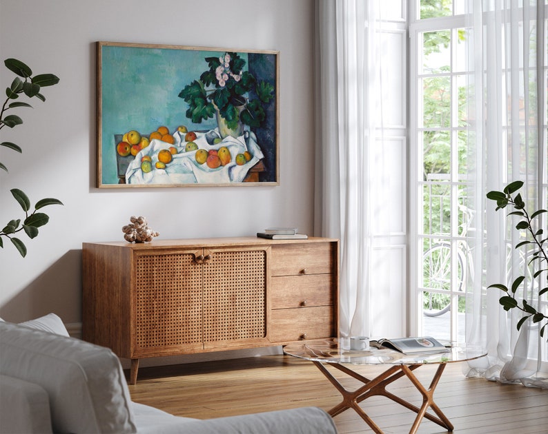 a living room with a painting on the wall