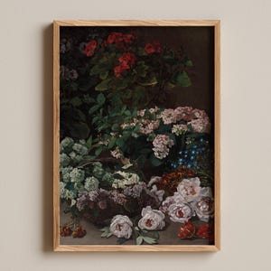 May include: A framed floral still life painting featuring a variety of flowers in shades of red, pink, white, and purple. The flowers are arranged in a basket and on a surface, with green foliage. The artwork has a vintage aesthetic.
