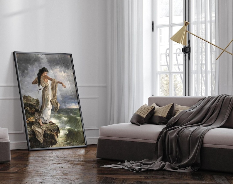 a large painting of a woman standing on a cliff overlooking the ocean, with a couch and a lamp in the background.