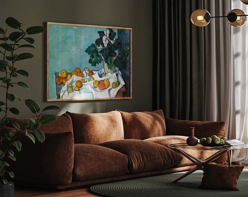 a living room filled with furniture and a painting on the wall