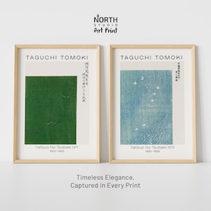 May include: Two framed art prints by Taguchi Tomoki titled Yatsuo No Tsubaki No. 1 and No. 3. The left print features a solid green rectangle, while the right print displays a textured blue pattern. Both prints include black text and Japanese characters.