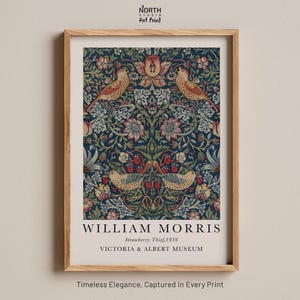 May include: A vintage print of William Morris's Strawberry Thief design. The print features a repeating pattern of birds, flowers, and leaves in shades of blue, green, red, and yellow. The print is titled "Strawberry Thief, 1936" and is credited to the Victoria & Albert Museum.