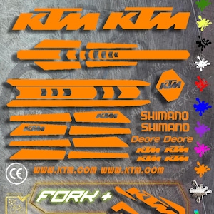 May include: Orange and black custom-made motorcycle decals with the text "KTM" and "FORK +" and a 3-year warranty.