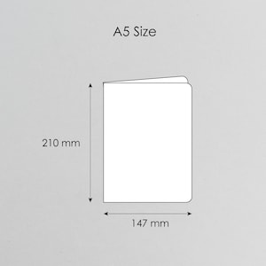 May include: A white A5 size document outline with black lines. The diagram displays a height of 210 mm and a width of 147 mm, indicated by black arrows and text labels. The text A5 Size is printed in black at the top of the image.