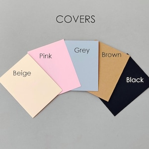 May include: A set of five rectangular covers arranged in a fan shape, labeled with the text COVERS at the top. The individual covers are colored beige, pink, grey, brown, and black, each with its corresponding color name printed on it.