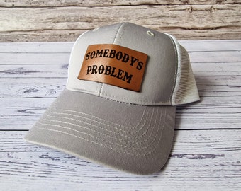 Somebodys Problem Trucker Hat With Leather Patch