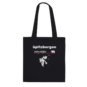 May include: Black tote bag with a white graphic of the Svalbard archipelago, a polar bear, and the text "Spitzbergen" and "NORWEGEN".