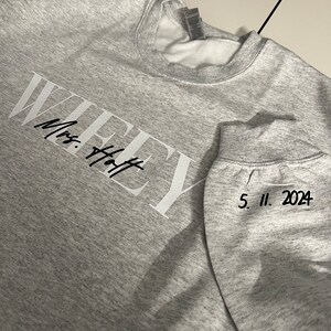 Customizable Wifey Crewneck Sweatshirt with Mrs detail and date detail for the perfect engagement gift for a bride to be