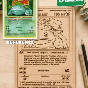 May include: A rectangular wooden plaque engraved with the detailed design of a Venusaur trading card, featuring the character illustration, text, and game statistics. A smaller color reference card is positioned above the wooden engraving.