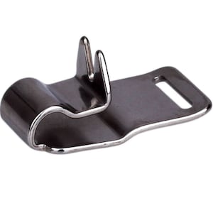 May include: A silver metal clip with a loop and a small hook. The clip is designed to hold a strap or cord in place.