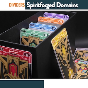 May include: A black box filled with colorful card dividers. Each divider has a unique design and the text "Spiritforged" and "SFD". The dividers are in various colors, including red, green, blue, orange, and purple.