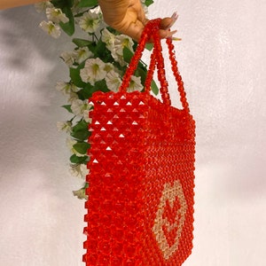 Bead bags are luxury and timeless fashion piece a fashion-forward woman should have in her closet.