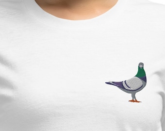 May include: White t-shirt with a small embroidered image of a gray and green pigeon.