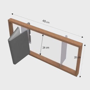 May include: A rectangular wooden picture frame with a clear glass front, designed to hold a book. The frame is 15.7 inches long, 9.4 inches high, and 10.6 inches wide. The book is gray.